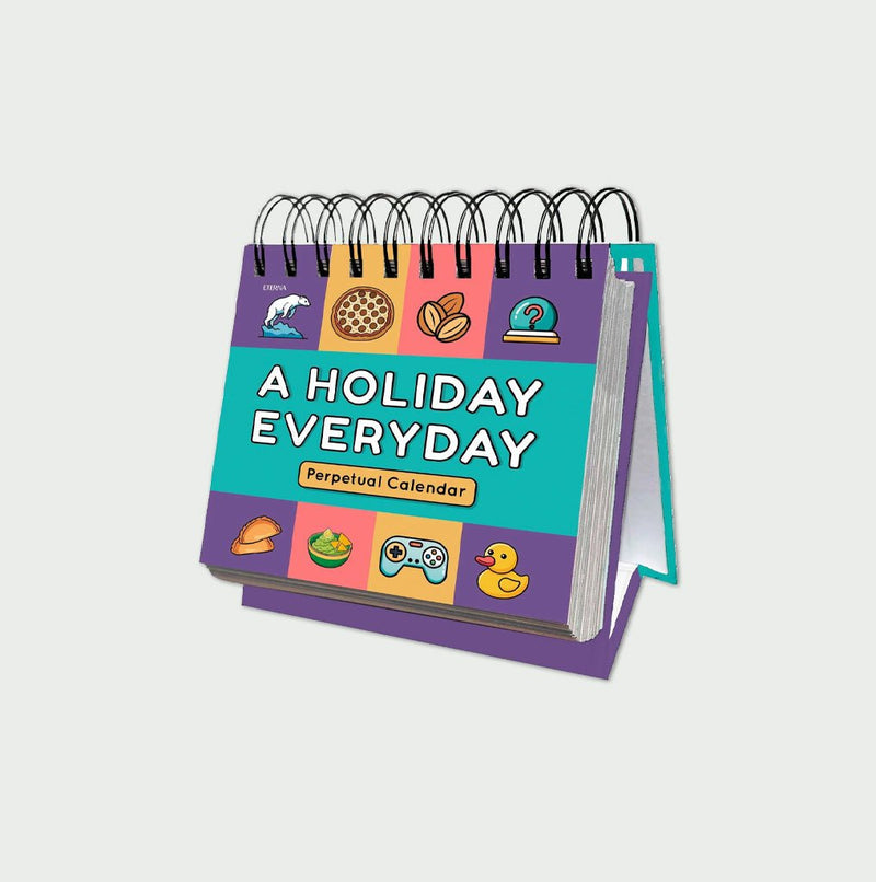 A colorful spiral-bound perpetual calendar titled "A Holiday Everyday," featuring playful icons like pizza, a clock, and a game controller on the cover.