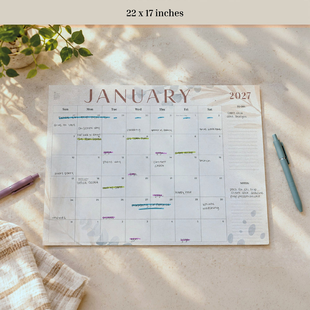 2027 Floral 12-Month Flat Desk Calendar, 22 x 17 inches, January page filled in with pens