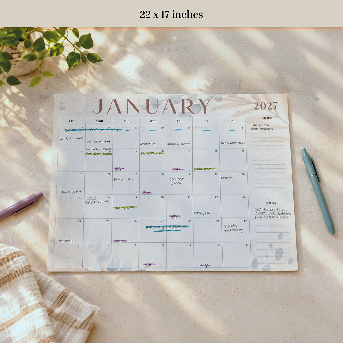 2027 Floral 12-Month Flat Desk Calendar, 22 x 17 inches, January page filled in with pens