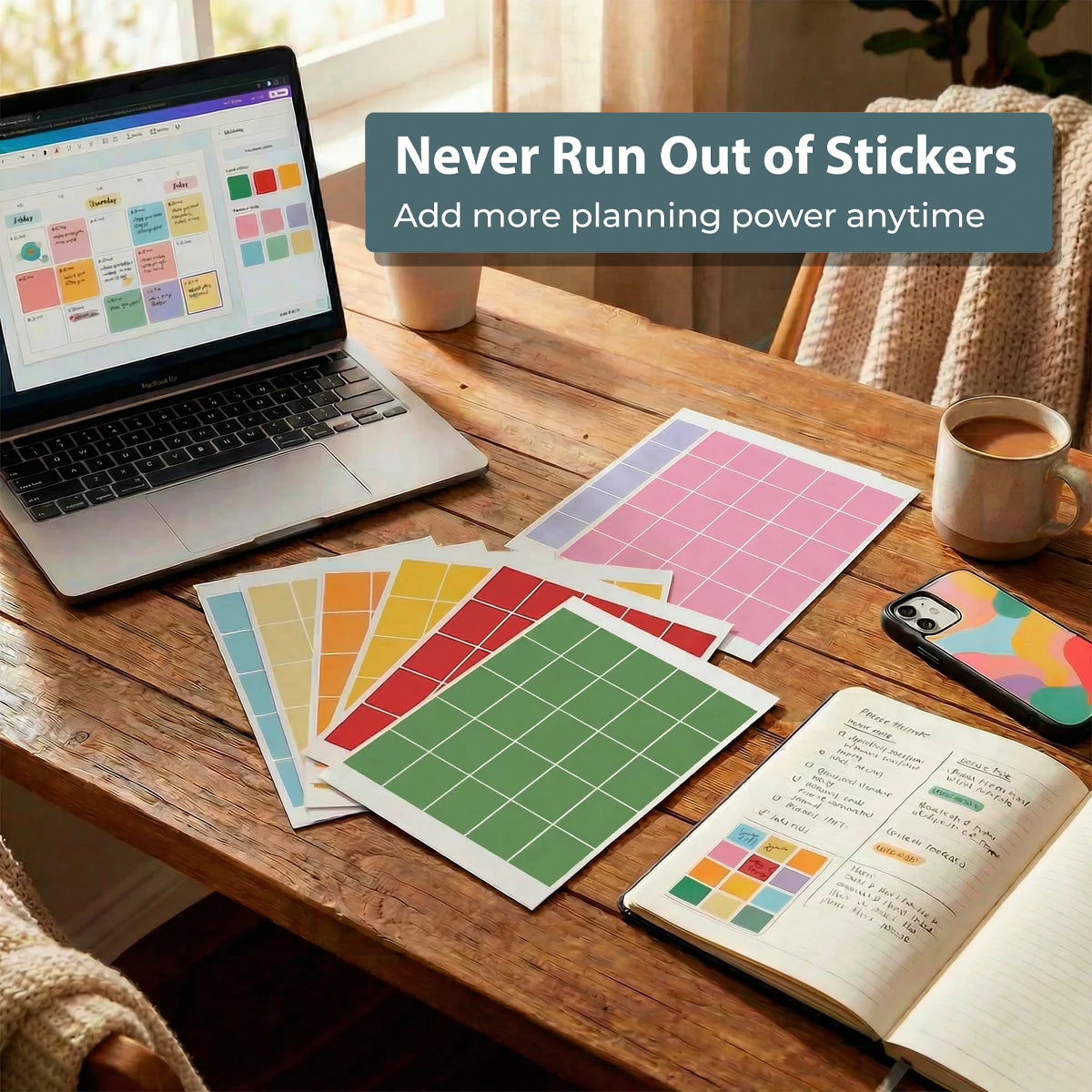 A laptop, coffee mug, and Eterna Goods Planning Block Stickers are on a wooden table next to an open notebook displaying a planner layout ideal for color-coded organization.