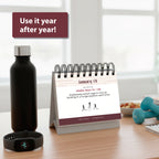 The Eterna Goods Perpetual Fitness Calendar shows a daily tip for January 1, sitting beside a water bottle and fitness tracker. A sign says, "Use it year after year!"—daily motivation from a reusable calendar built to last.