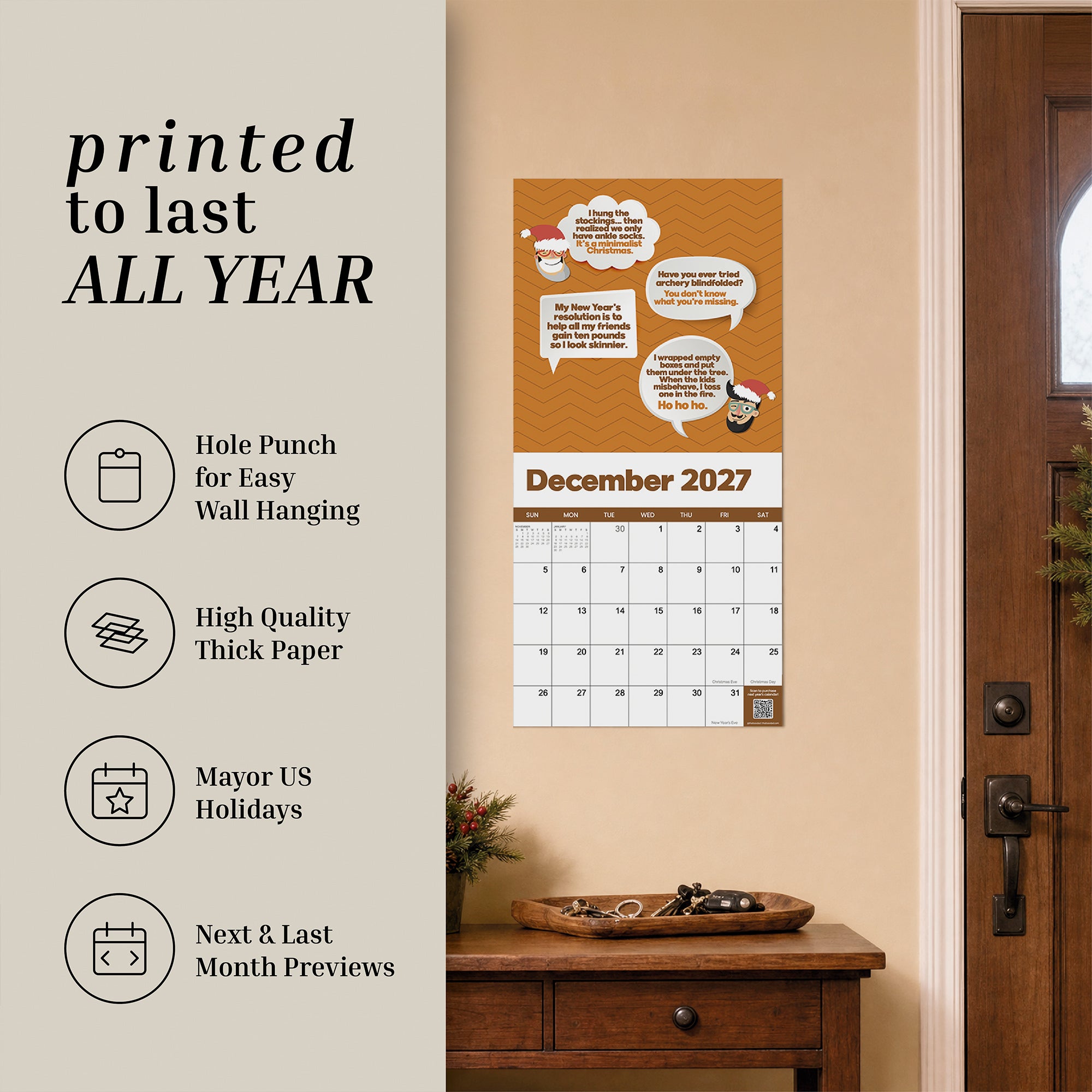 The 2027 Dad Joke Wall Calendar from That Is So Dad hangs near a door, featuring icons and text that highlight its thick paper, US holidays, wall punch for easy hanging, and month previews. Perfect for bringing humor to your daily routine, this calendar combines functionality with fun.