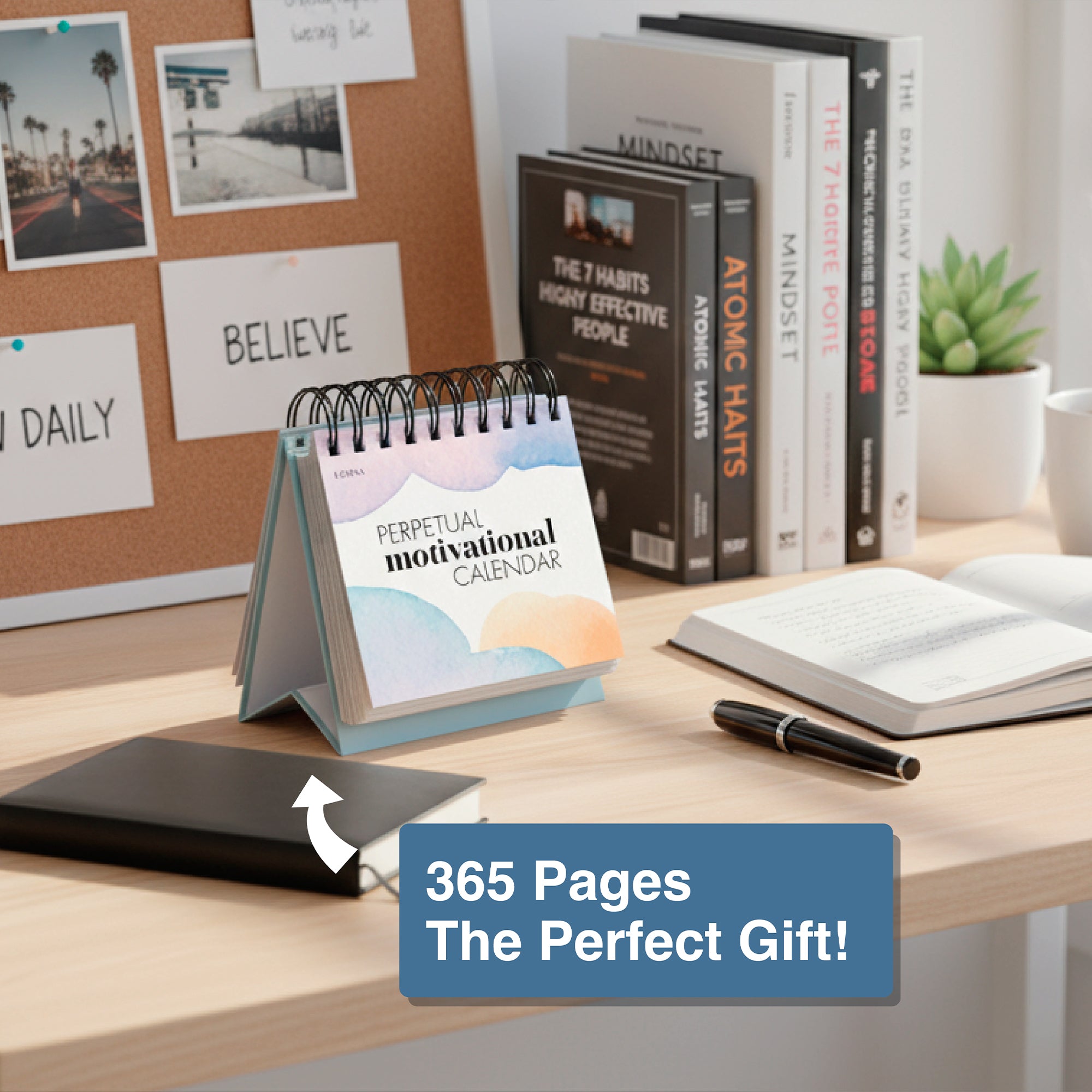 A desktop displays the Eterna Goods Motivational Perpetual Calendar with inspiring quotes, alongside a closed notebook, pen, and motivational books; a bulletin board with photos and notes is in the background.