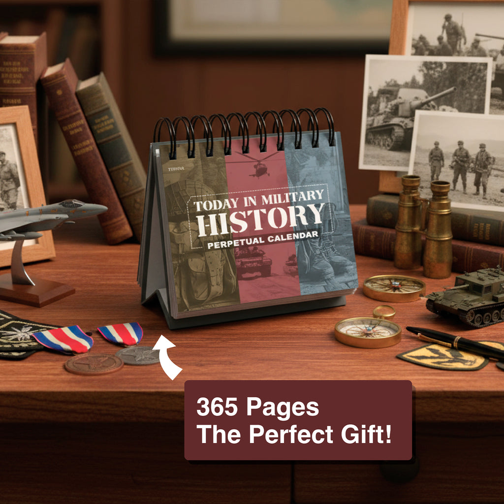 The Eterna Goods "Today In Military History Perpetual Calendar" sits on a wooden desk with medals, coins, and books; the label says "365 Pages The Perfect History Gift!"—an ideal pick for military history fans who love daily facts.