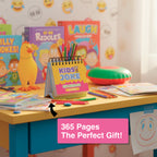 A colorful desk features Charlie's Treasures Perpetual Kids Jokes Calendar, children's joke books, pencils, a rubber chicken, and a red-green buzzer. Text: "365 Pages The Perfect Gift!"—daily kid-friendly jokes in a fun desk calendar.