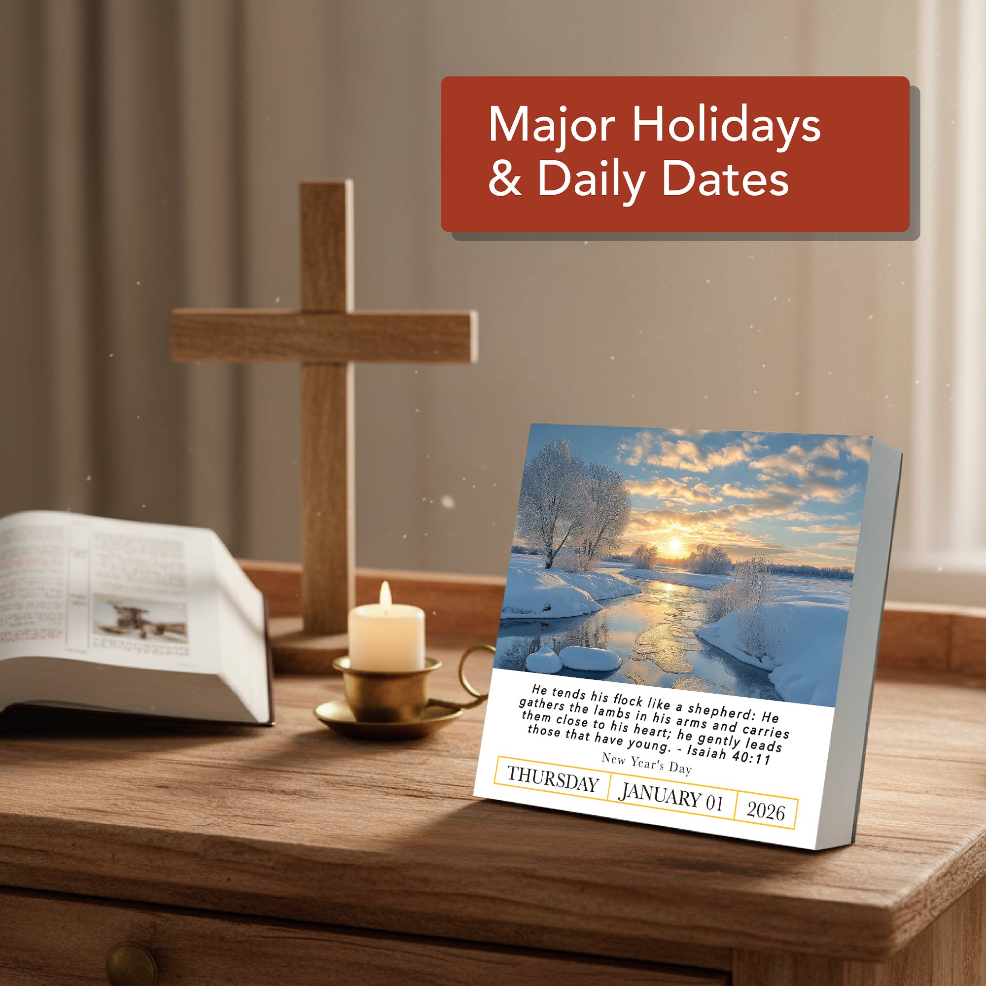 On a wooden table: a cross, open book, candle, and an inspirational desk gift—the Hannah Faith 2026 Verse A Day Calendar set to Thursday, January 1, featuring a winter scene and mindful verses.
