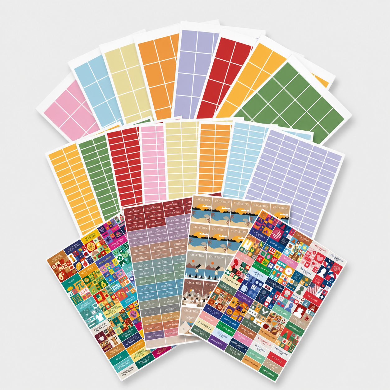 A vibrant mix of rectangular planner stickers and illustrated icon sheets from Eterna Goods' Own The Year Sticker Bundle, fanned out—ideal for organizing your schedule.