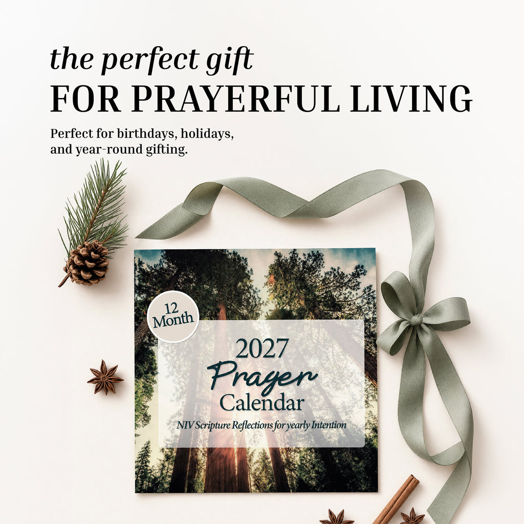 A Hannah Faith 2027 Prayer Wall Calendar, featuring a ribbon, pine cone, and spices, is beautifully arranged on a light background. The text highlights it as a thoughtful faith-based gift ideal for prayerful living. For year-round inspiration, pair it with a Hannah Faith 2026 Wall Calendar or Bible Verse Calendar.