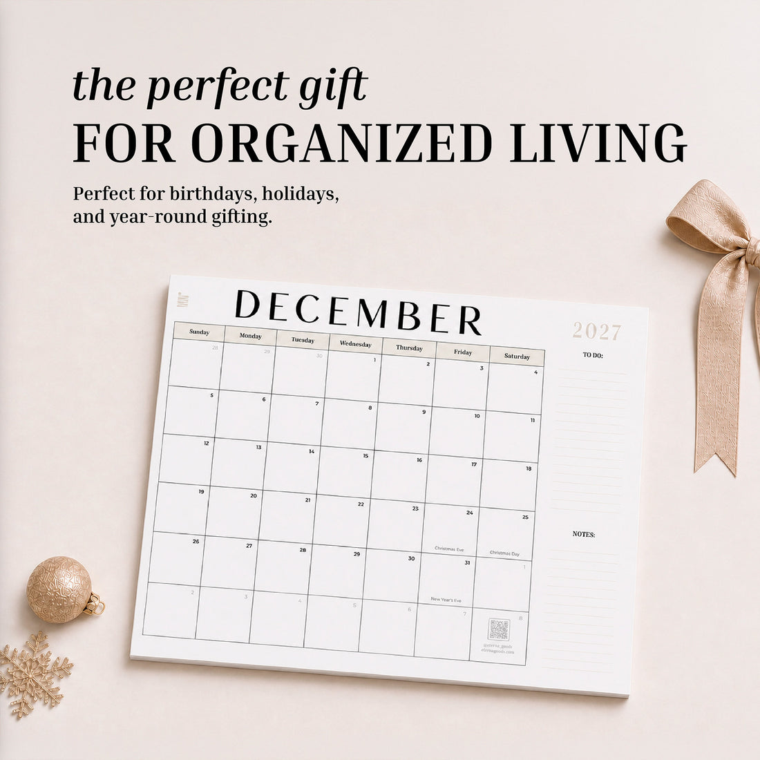 2027 flat desk calendar December page styled as a gift with a ribbon