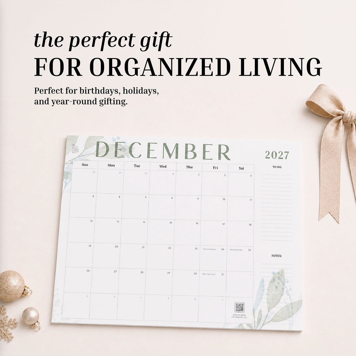 2027 Floral flat desk calendar December page styled as a gift with a ribbon