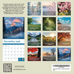 Back cover of the 2026 Bible Verse Wall Calendar by Hannah Faith features scenic monthly landscapes with Bible verses; December displays a snowy mountain. Includes product details, social media icons, and barcode.
