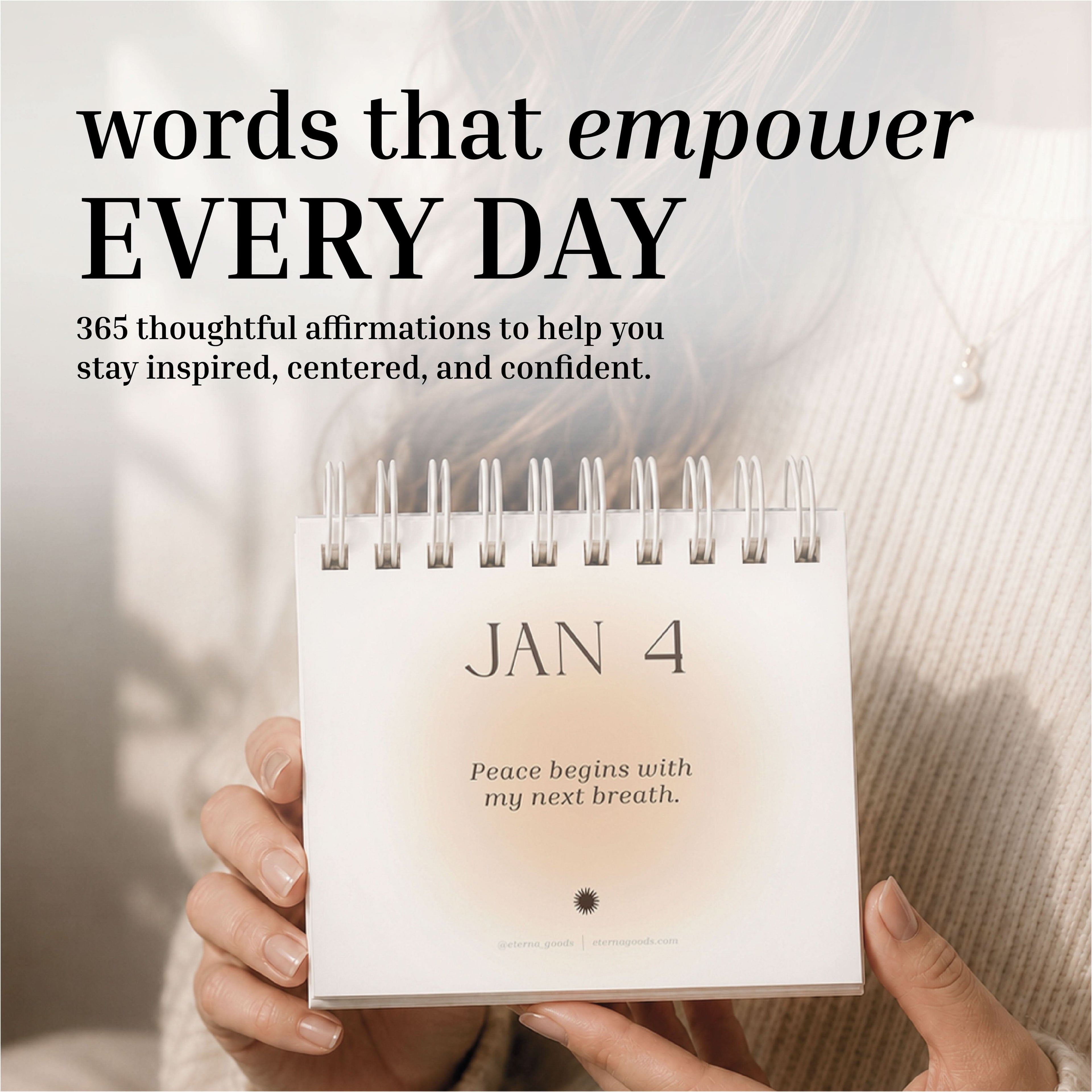 A person holds the Eterna Goods Perpetual Affirmations Calendar open to January 4, revealing the message: "Peace begins with my next breath," providing daily inspiration and fostering a positive mindset.