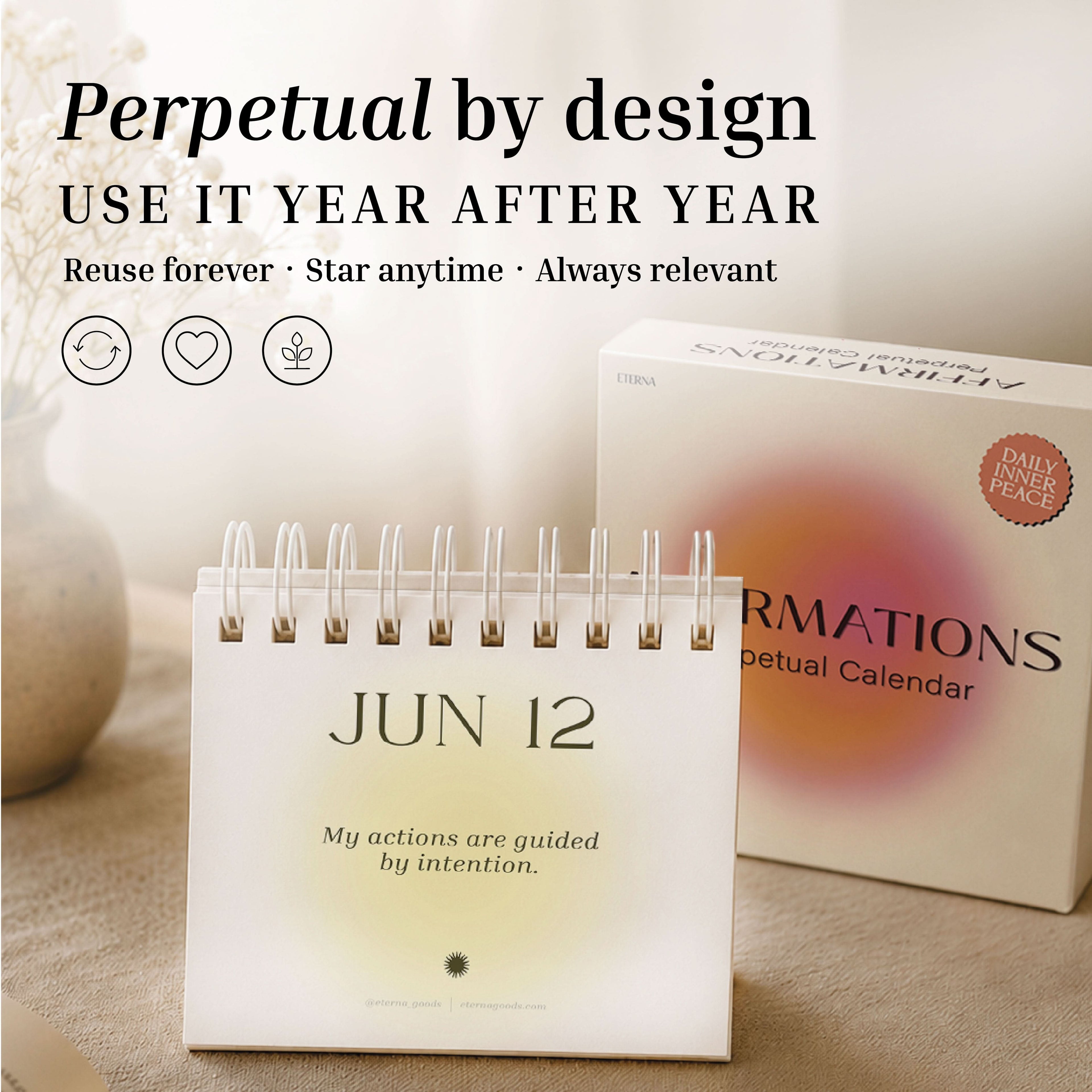 The Eterna Goods Perpetual Affirmations Calendar, shown spiral-bound and open to June 12 with the affirmation “My actions are guided by intention,” sits beside its vibrant box on a desk, offering daily inspiration for a positive mindset.