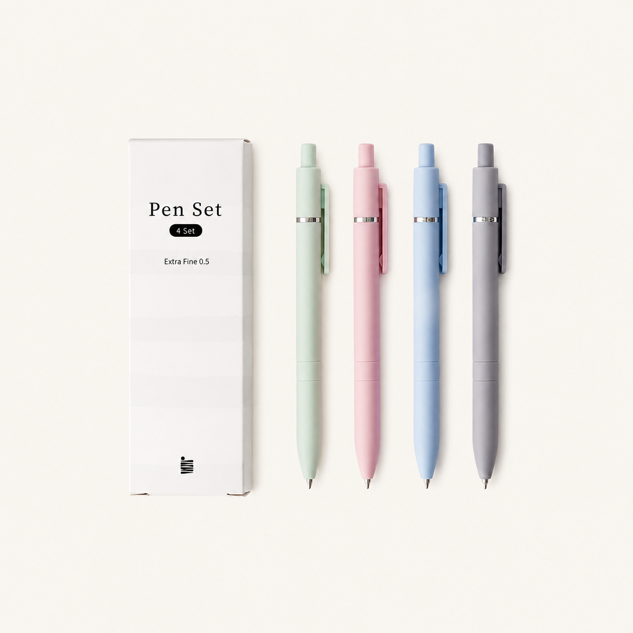 A box labeled “Extra Fine Ball Point Pen Set” from Eterna Goods sits next to four fine-tip pens in pastel green, pink, blue, and gray, each providing smooth ink flow with precise 0.5mm tips.