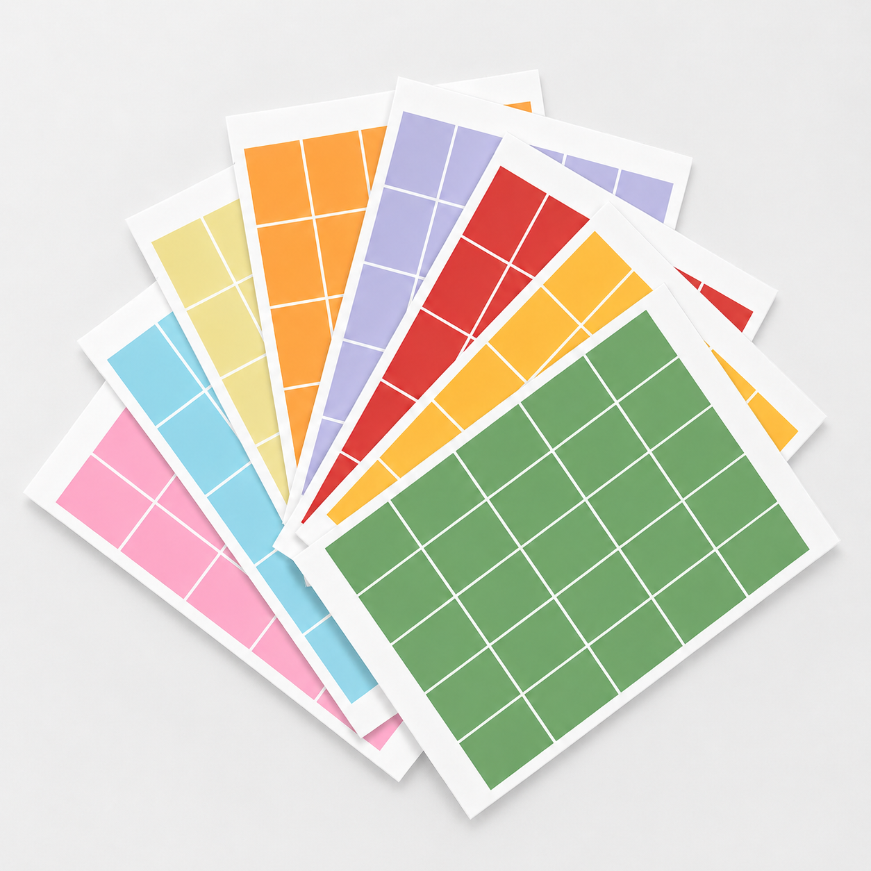 Eterna Goods Planning Block Stickers—colorful sheets in green, pink, yellow, orange, purple, and red for planner or calendar use—are displayed fanned out on a white background.