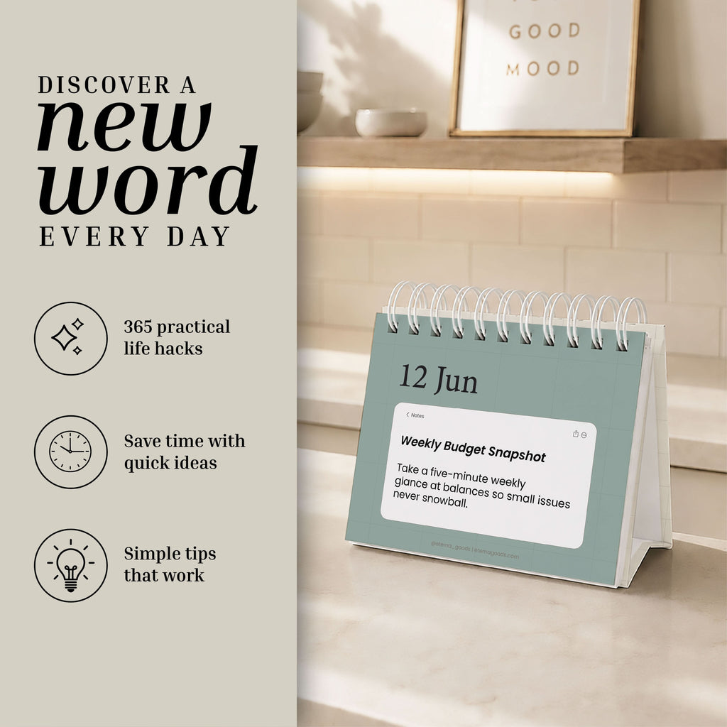 The Perpetual Life Hacks Calendar by Eterna Goods sits neatly on a table, showcasing "12 Jun" and a helpful budgeting tip. To the left, three icons represent daily life hacks, productivity tips, and practical advice. The calendar is set against a neutral, organized room backdrop.