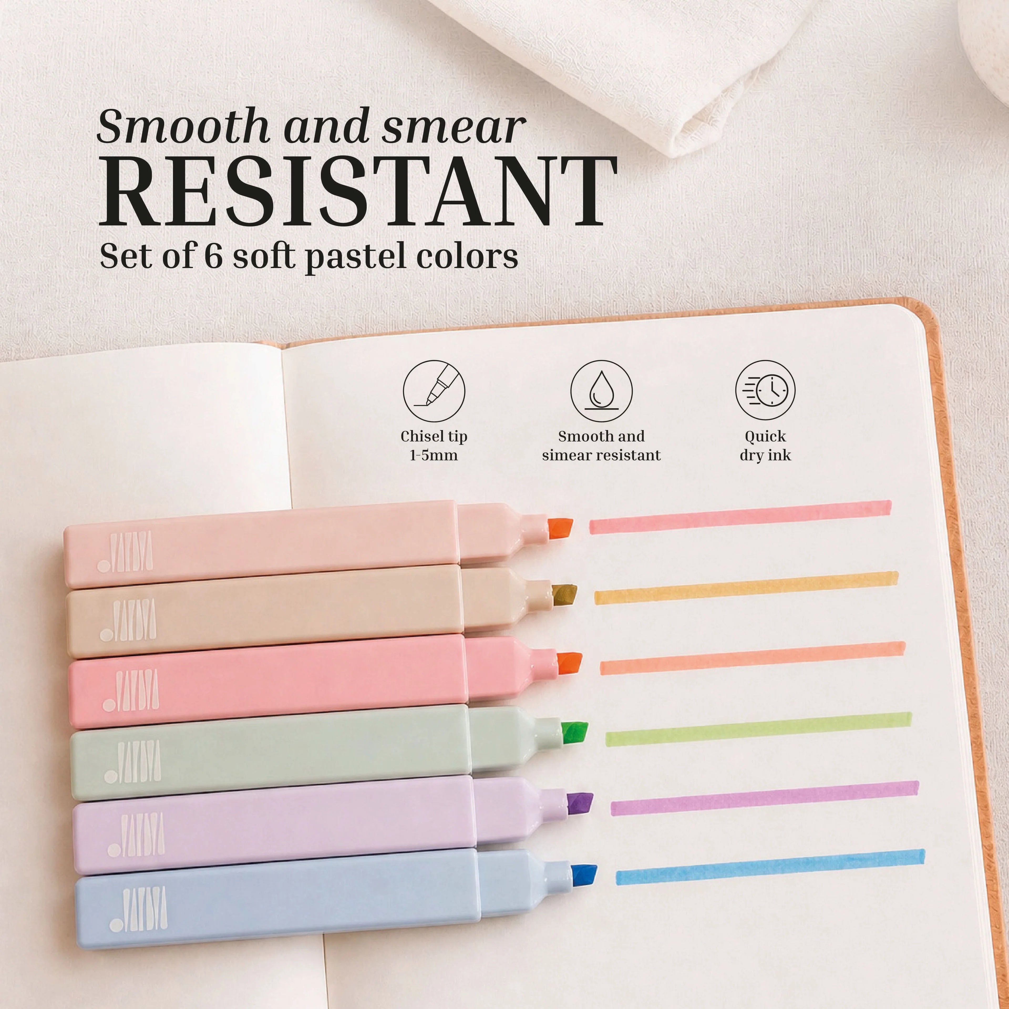 Six chisel tip pastel highlighters from Eterna Goods are arranged beside a notebook displaying coordinating colored lines. These smooth, smear-resistant, and quick-drying highlighters come in a set of six—perfect for your Planning Essentials Kit.