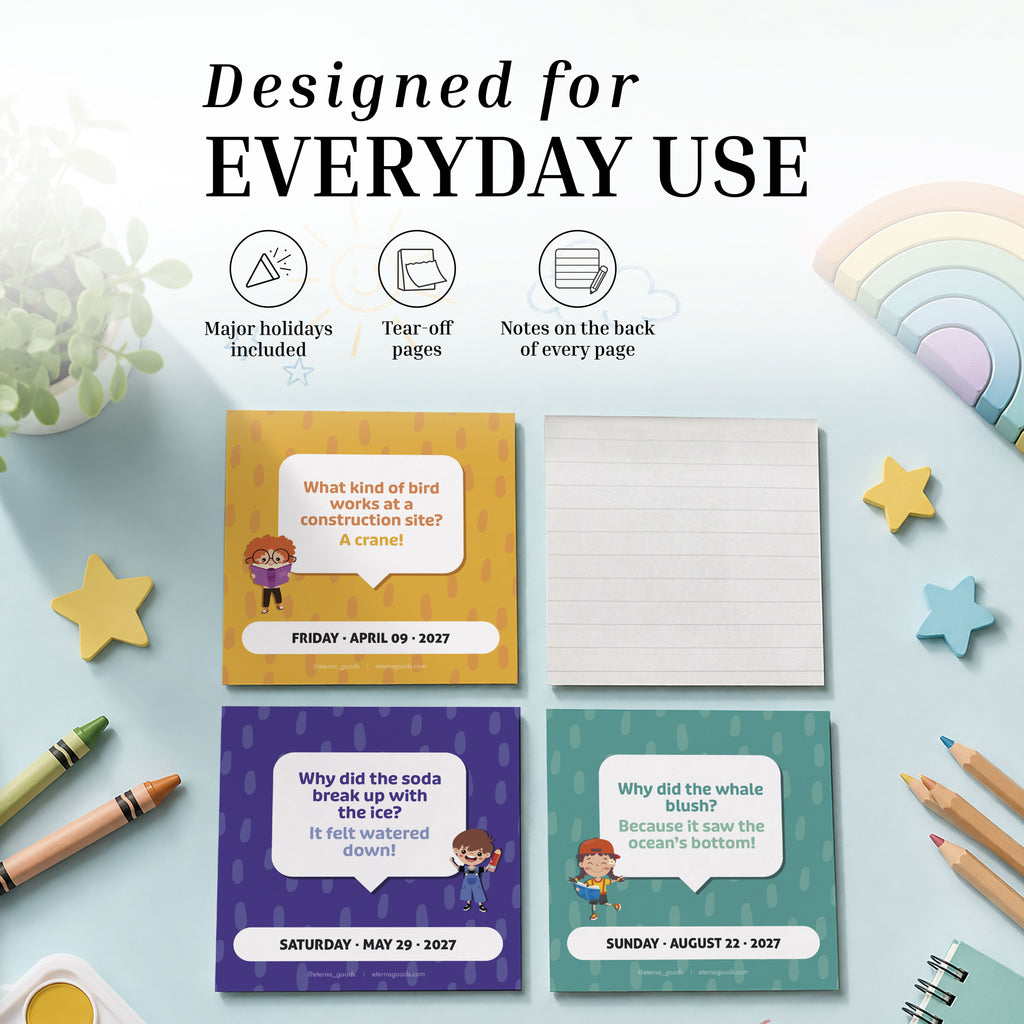 Charlie's Treasures 2027 Kids Jokes Calendar—with daily joke pages, colorful pencils, paper clips, erasers, and a cheerful rainbow decoration—brightens up any white desk, making it a delightful gift for kids.