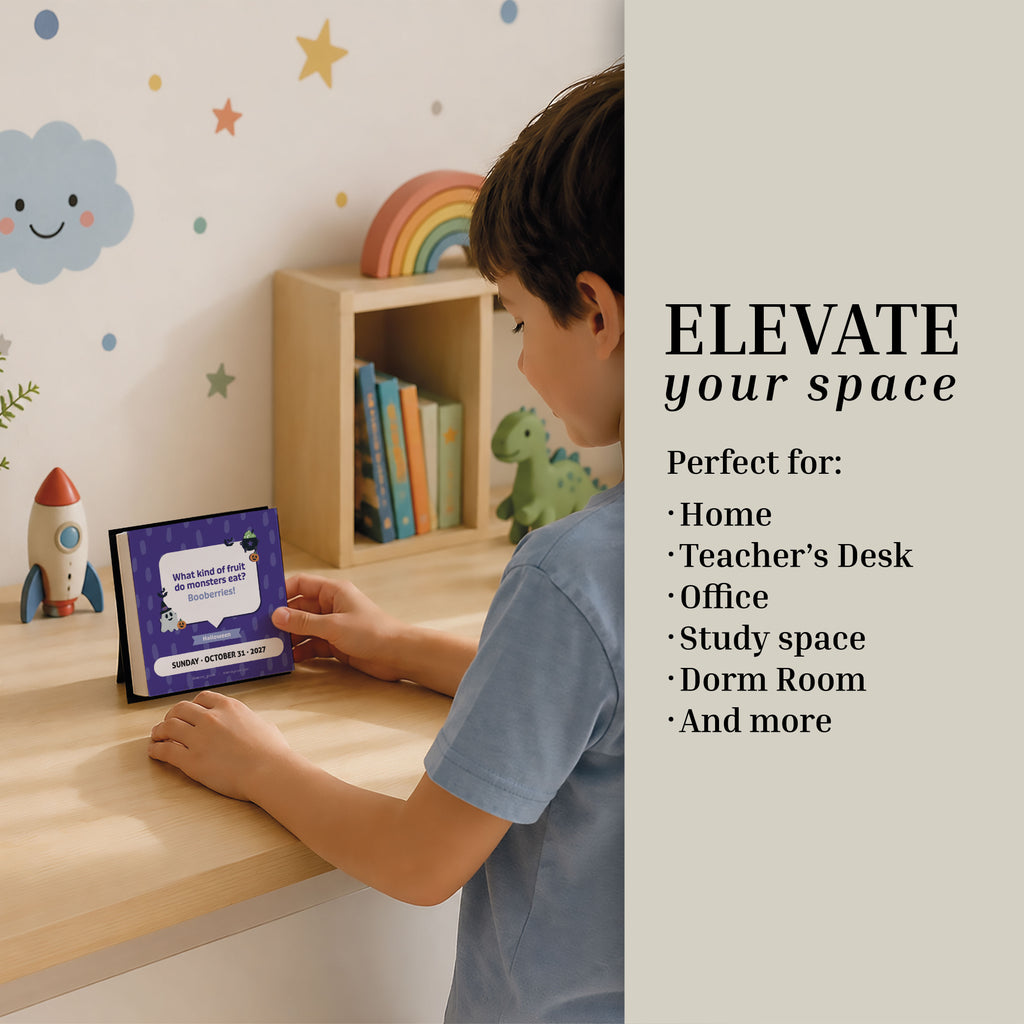 A boy in a blue shirt looks at a digital display on a desk in a decorated room. Text reads, “ELEVATE your space. Perfect for: Home, Teacher’s Desk, Office, Study space, Dorm Room, And more.” The 2027 Kids Jokes Calendar by Charlie's Treasures makes a wonderful gift for kids and adds fun to any space.