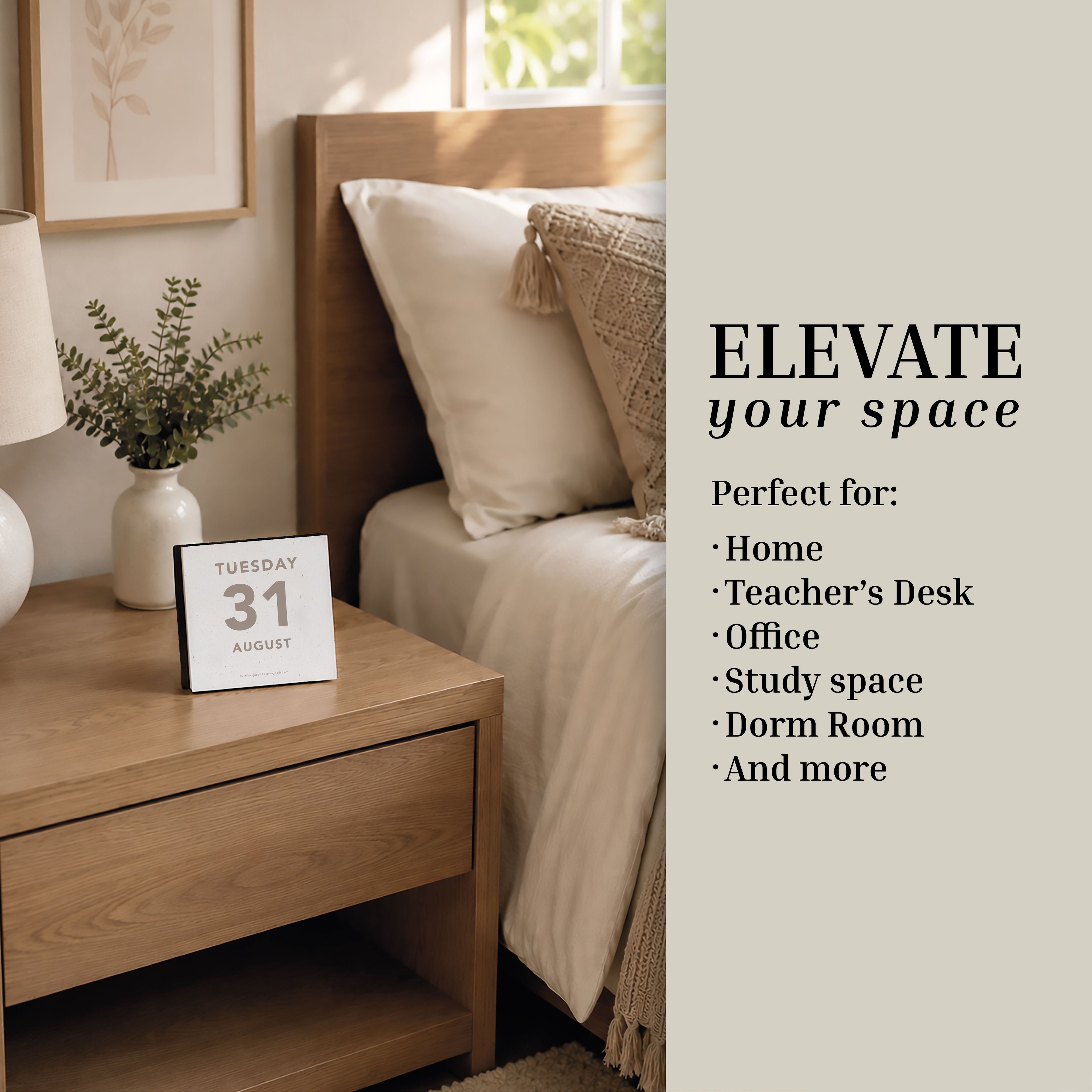 A neatly made bed beside a wooden nightstand features the Eterna Goods 2027 Large Text Calendar, with easy-to-read dates showing Tuesday, 31 August, complemented by a vase with greenery and a framed picture—promoting simple ways to elevate your space.