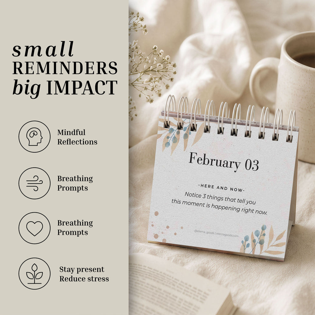 A Perpetual Mindfulness Calendar by Eterna Goods, open to February 3, sits on a table next to a mug, displaying mindfulness and breathing prompts on the left side.