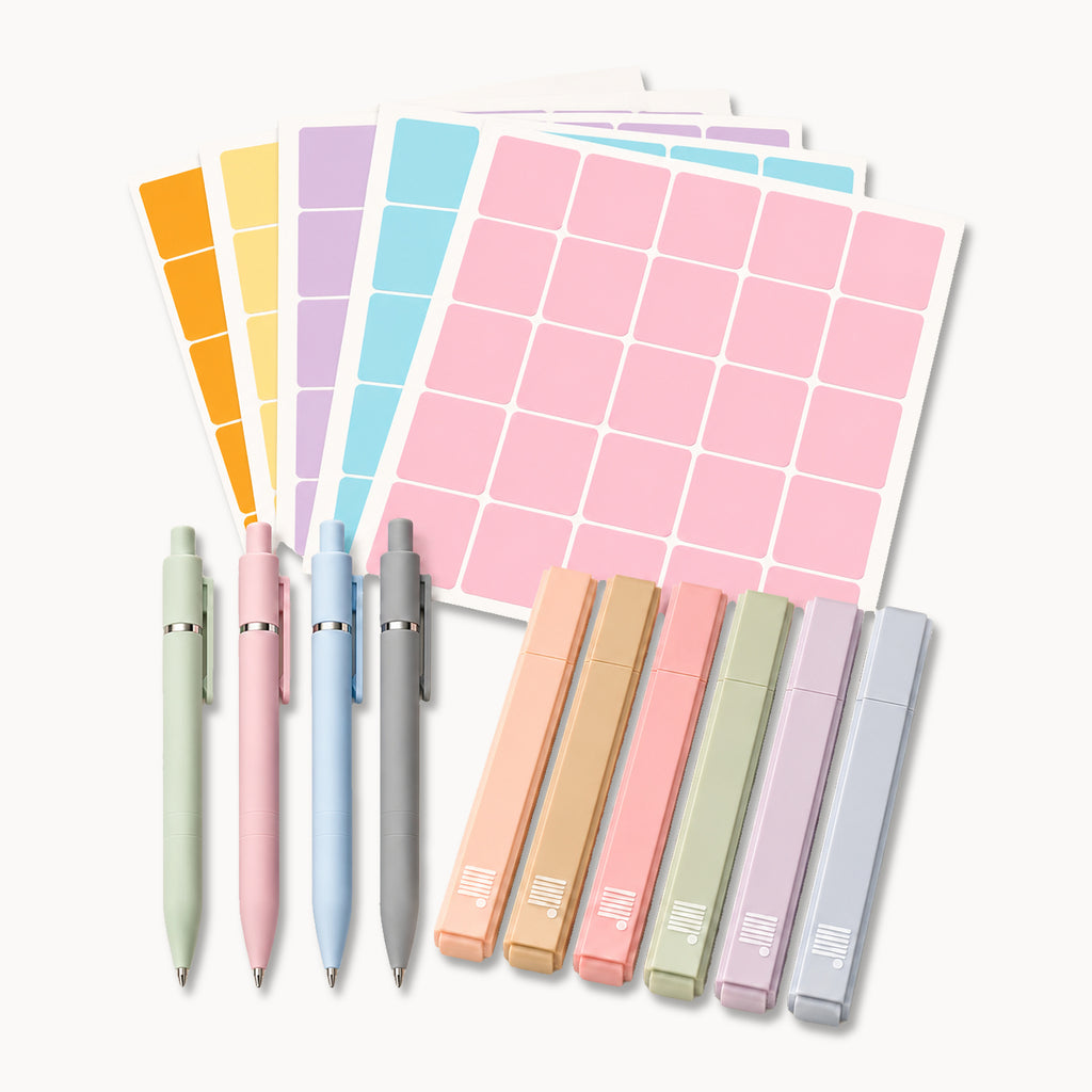 The Planning Essentials Kit by Eterna Goods features five fine-tip pens, five pastel highlighters, and four sheets of rectangular colored stickers—everything you need for perfect planning arranged on a light surface.