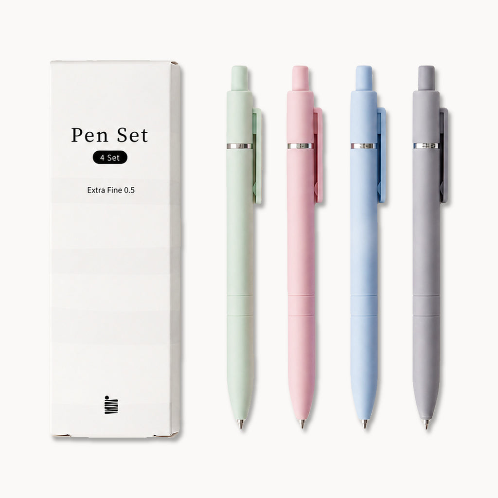 A box labeled “Extra Fine Ball Point Pen Set” from Eterna Goods sits next to four fine-tip pens in pastel green, pink, blue, and gray, each providing smooth ink flow with precise 0.5mm tips.