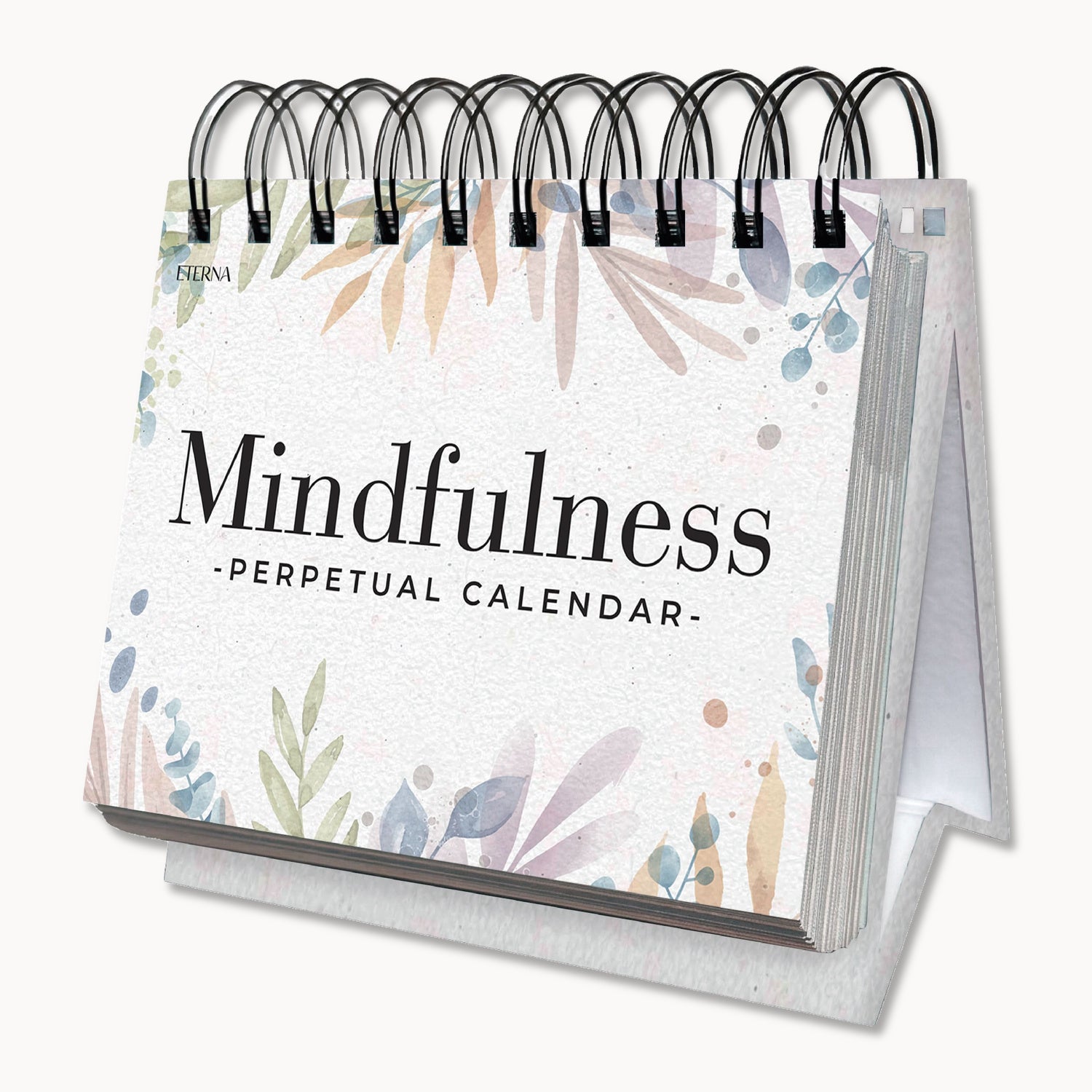 A spiral-bound stand-up calendar titled "Perpetual Mindfulness Calendar" by Eterna Goods, featuring a decorative pastel leaf design on the cover.