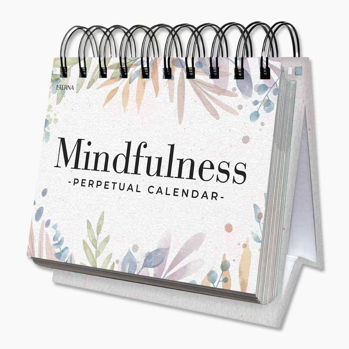A spiral-bound stand-up calendar titled "Perpetual Mindfulness Calendar" by Eterna Goods, featuring a decorative pastel leaf design on the cover.