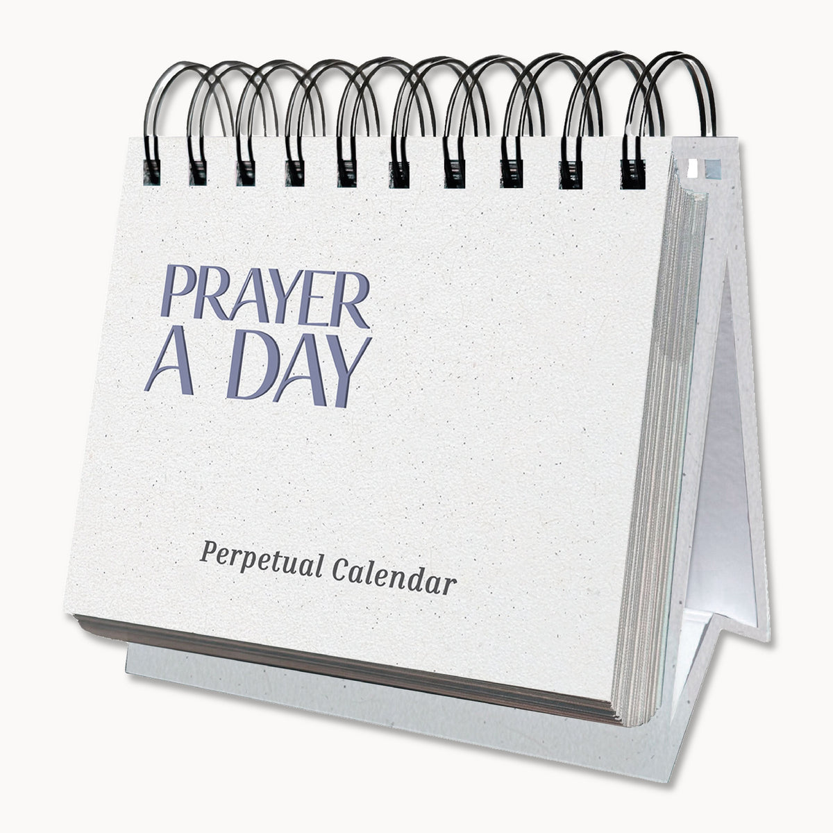 The Eterna Goods Perpetual Prayer A Day Calendar is a white, spiral-bound calendar designed to stand upright, featuring inspirational prayers for each day of the year.