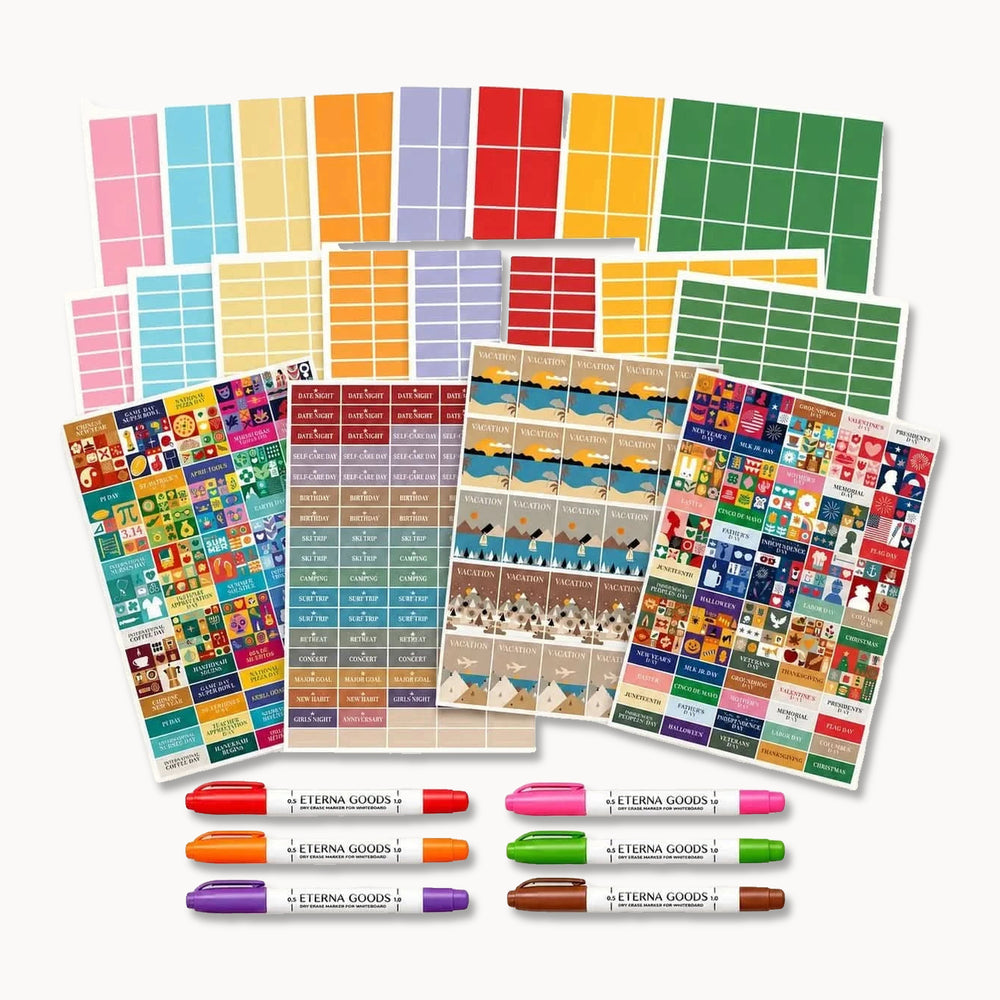 The Own The Year Planning Kit: holiday stickers, full-size and quarter-size planning block stickers and 6 dual-tip dry-erase markers