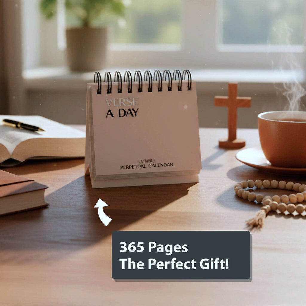 A desk with a Hannah Faith "Verse A Day Perpetual Calendar," a cup of tea, an open book, a rosary, and a wooden cross; caption reads "365 Days of Inspiration—The Perfect Gift!.