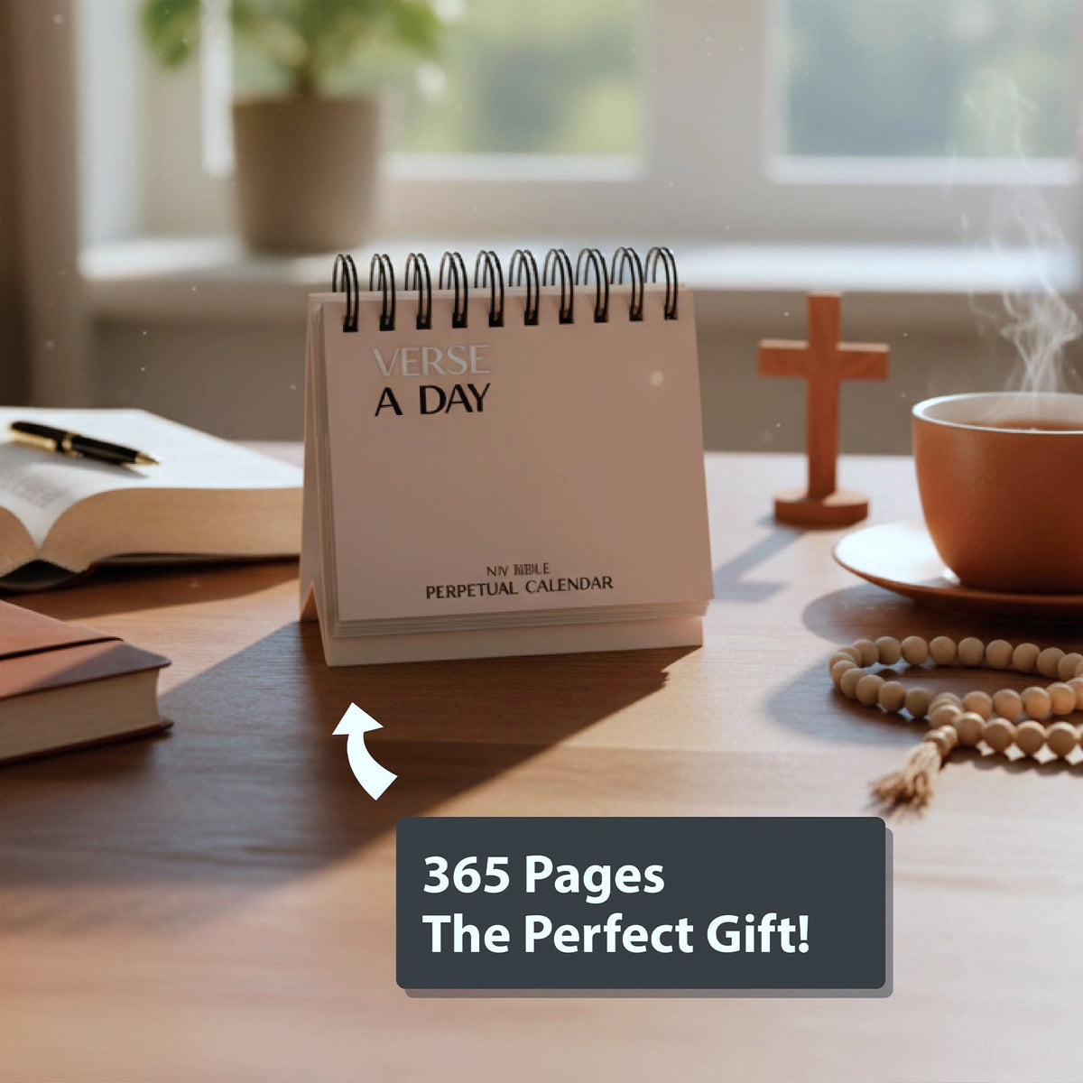 A desk with a Hannah Faith "Verse A Day Perpetual Calendar," a cup of tea, an open book, a rosary, and a wooden cross; caption reads "365 Days of Inspiration—The Perfect Gift!.
